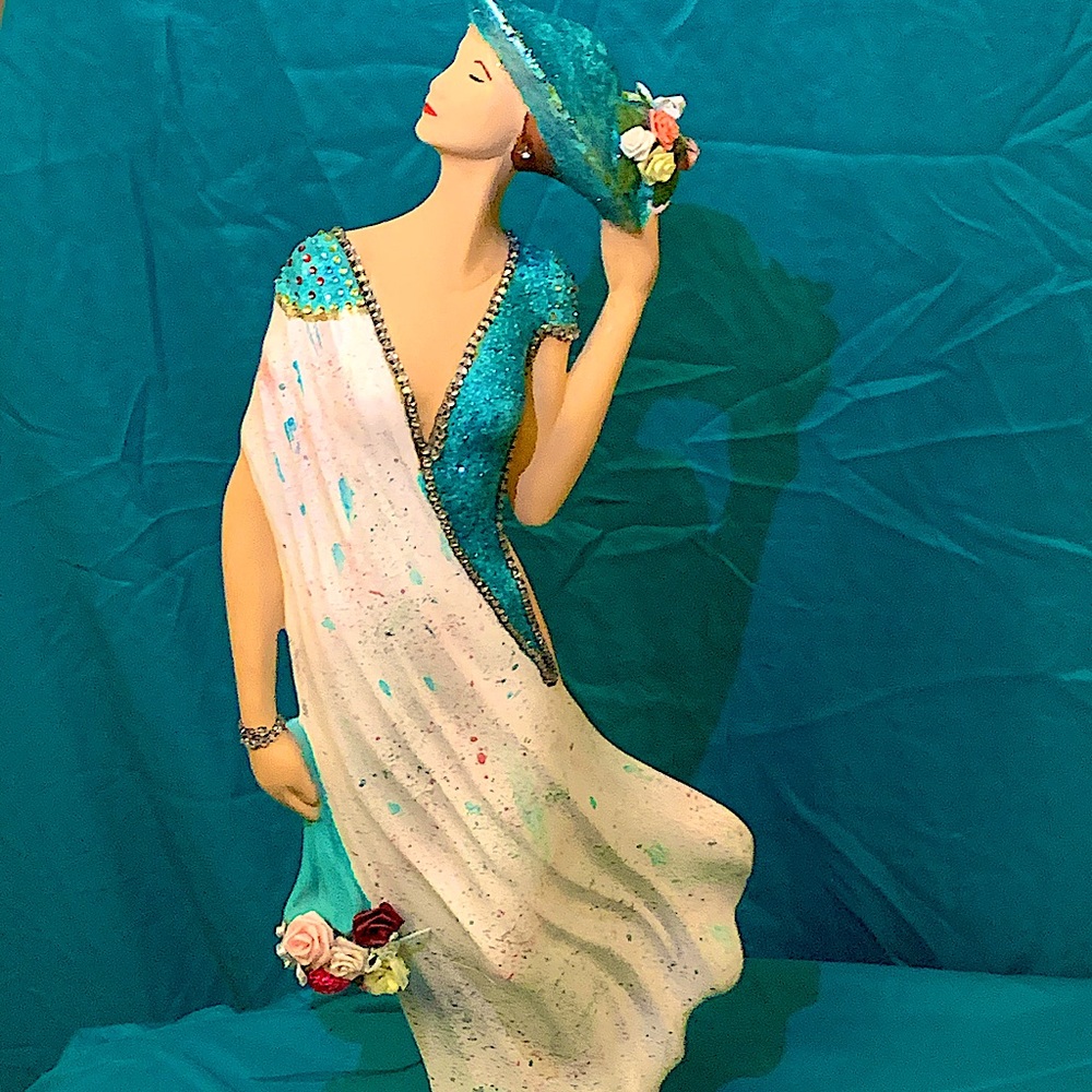 Hand-painted ceramic stature, artist signed 24 1/2” tall. One of a kind piece.